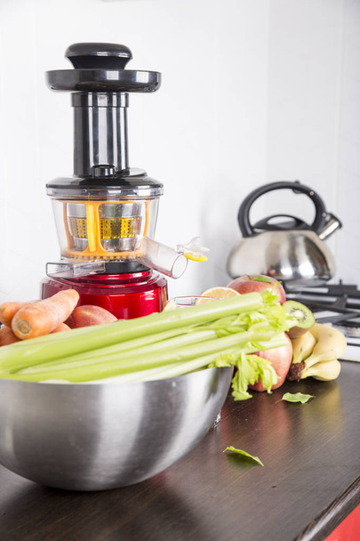 juicing fresh beautiful bright vegetables and fruits - Photo, image