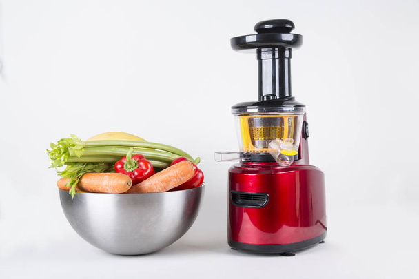juicing fresh beautiful bright vegetables and fruits - Foto, Imagen