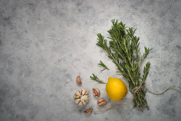 Herbs and spices at gray concrete table.  - 写真・画像