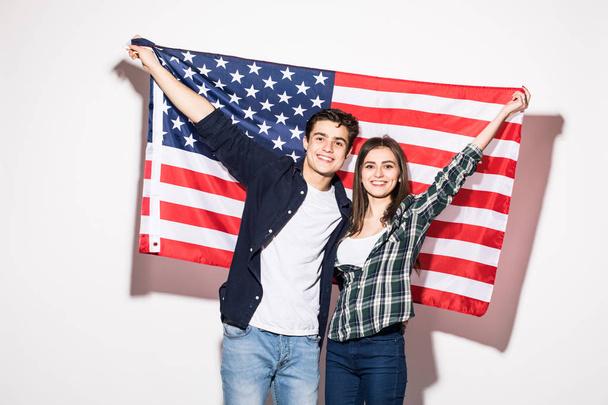 couple on the background of the US flag - Fotoğraf, Görsel