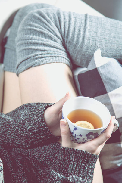 Relaxing concept with hot tea and sofa - Foto, Imagem