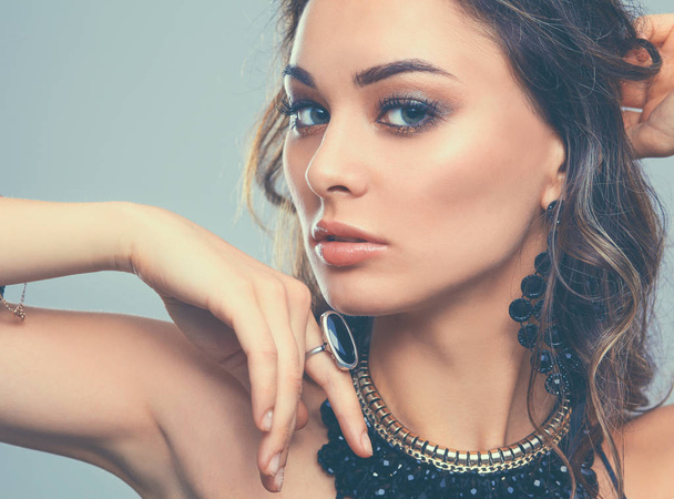 Portrait of a beautiful woman with necklace - Photo, Image
