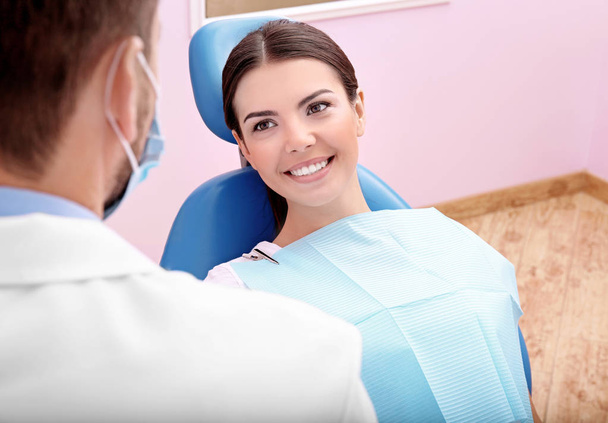 Young woman visiting dentist in clinic - Photo, Image