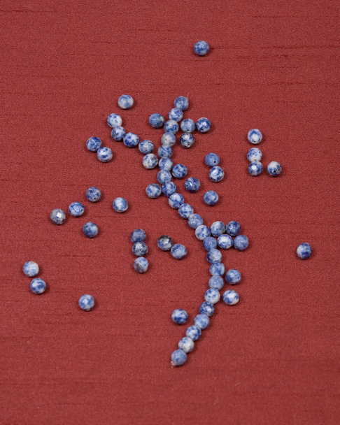 Round faceted sodalite beads and string - Photo, Image