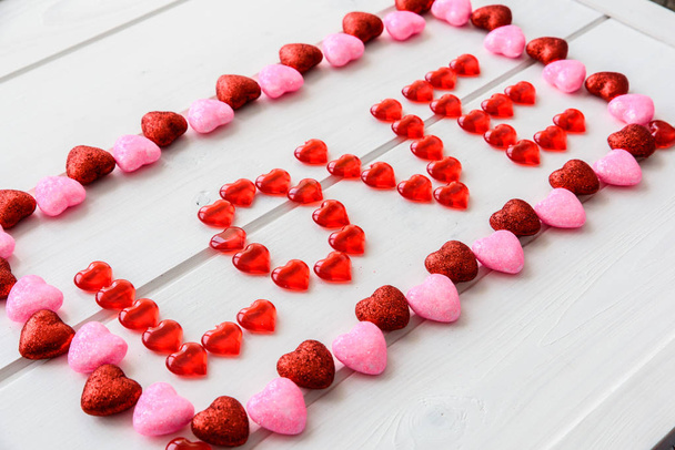 Valentines Day background with love text on grunge wooden desk - Zdjęcie, obraz