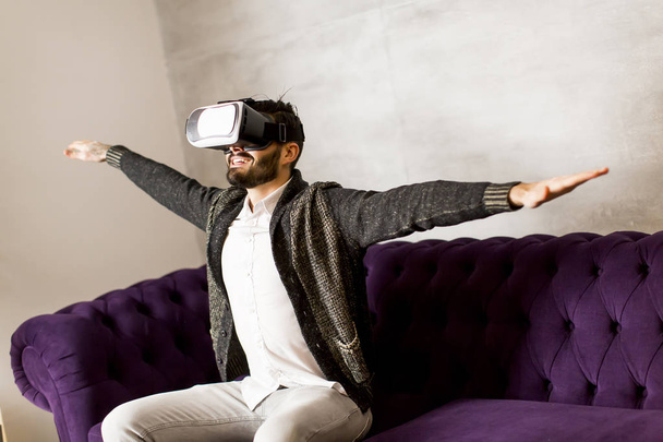 Man wearing virtual reality goggles - Photo, Image