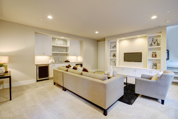 Chic basement living room with wet bar - Photo, Image