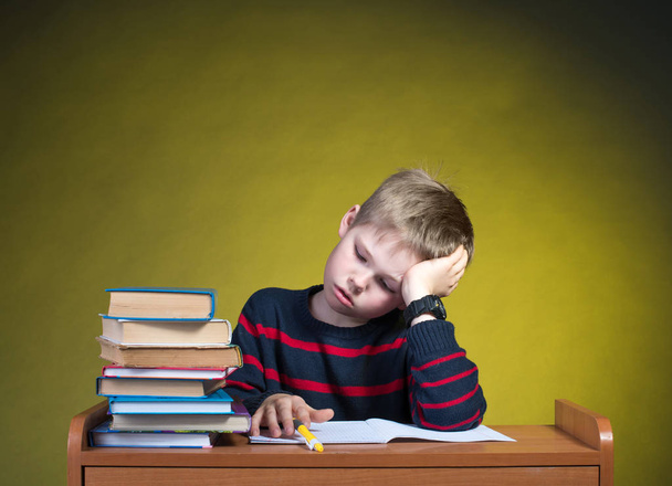 Unhappy Tired Little Boy Doing His Homework. Boring School Studies. Education Concept. - Photo, image