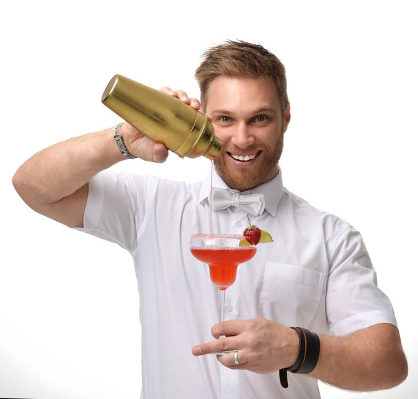 Bartender men is making red margarita cocktail with strawberry a - Φωτογραφία, εικόνα
