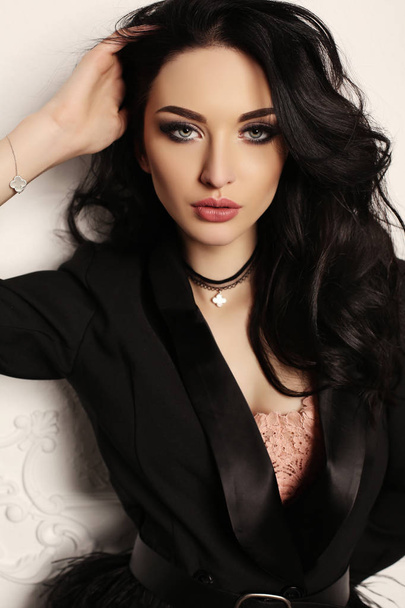 gorgeous woman with dark hair and evening makeup  - Zdjęcie, obraz