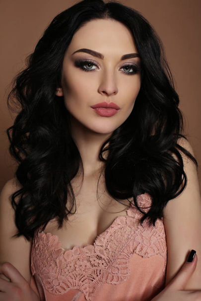 gorgeous woman with dark hair and evening makeup  - Fotoğraf, Görsel