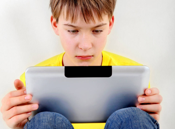 Sad Kid with Tablet Computer - Fotografie, Obrázek