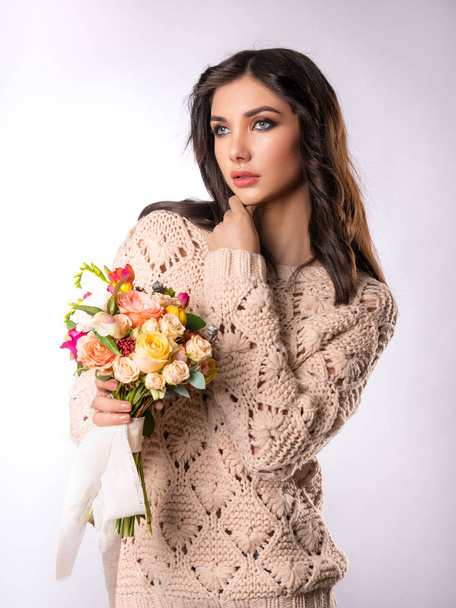 Girl with bouquet of flowers - Photo, Image