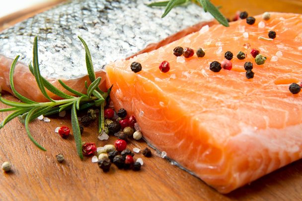 Fresh salmon fillet on wooden board - Photo, Image