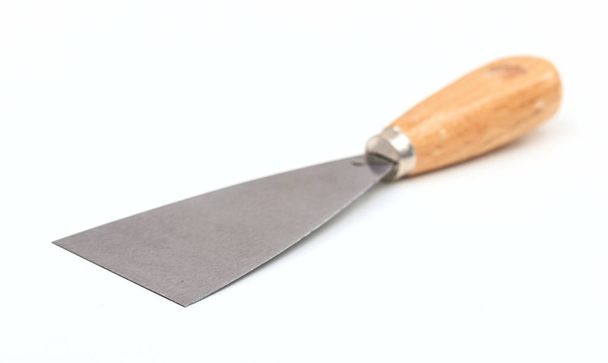 fém spatula fehér háttér - Fotó, kép