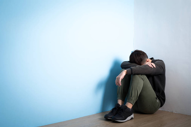 depressed man sitting on floor - Valokuva, kuva