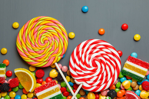 різнокольорові цукерки та жувальна гумка фону
 - Фото, зображення