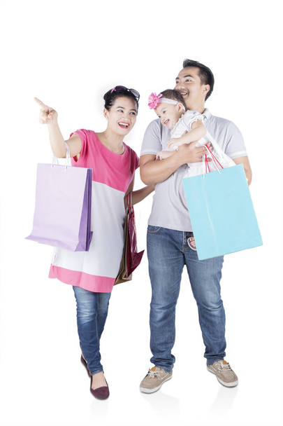 Cheerful family shopping together  - Фото, зображення