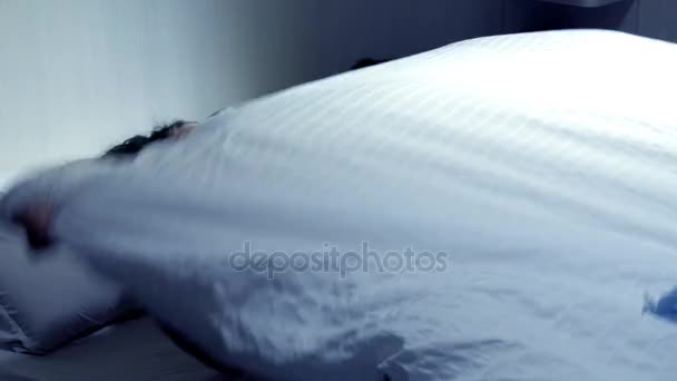Couple in bed fighting at night about blanket - Filmagem, Vídeo