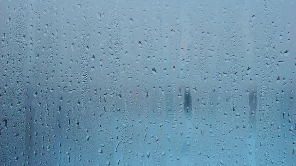 雨ドロップ テクスチャ背景から青い水 - 写真・画像