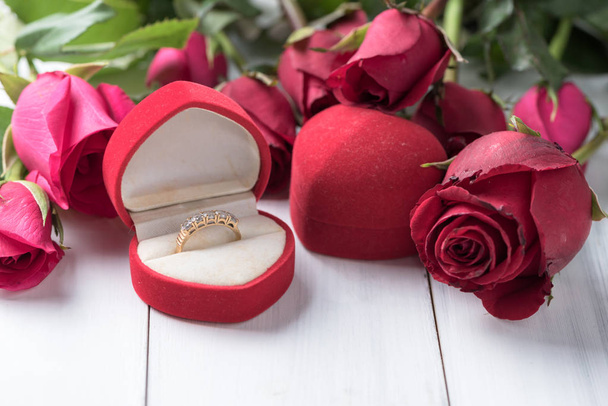 Diamond wedding ring in box gift on wood - Photo, Image