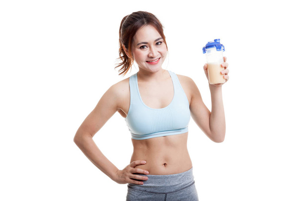 Beautiful Asian healthy girl with whey protein. - Foto, Imagen
