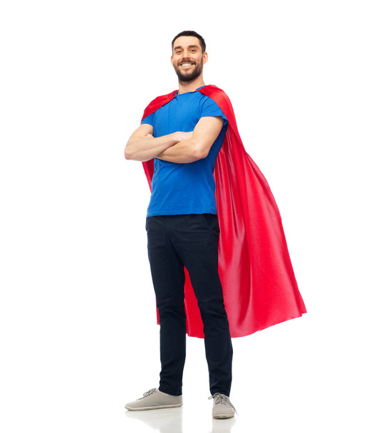 happy man in red superhero cape - Фото, изображение