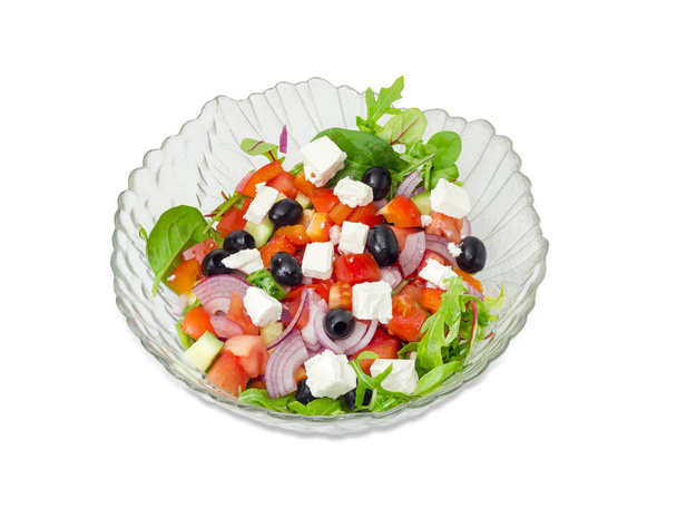 Kreikkalainen salaatti lasisalaattikulhossa
 - Valokuva, kuva