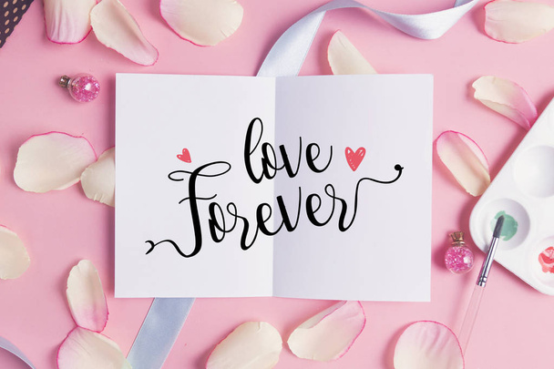 Love forever on pastel background. - Foto, Bild