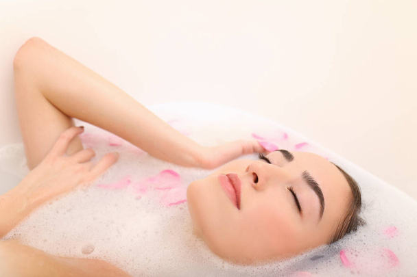 woman taking relaxing bath - 写真・画像