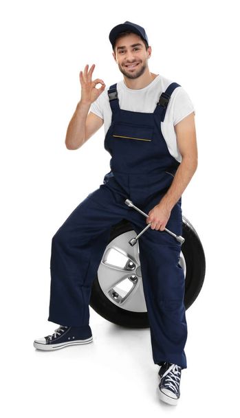 Young mechanic in uniform - Фото, зображення