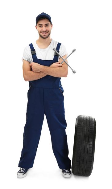 Young mechanic in uniform - Fotoğraf, Görsel