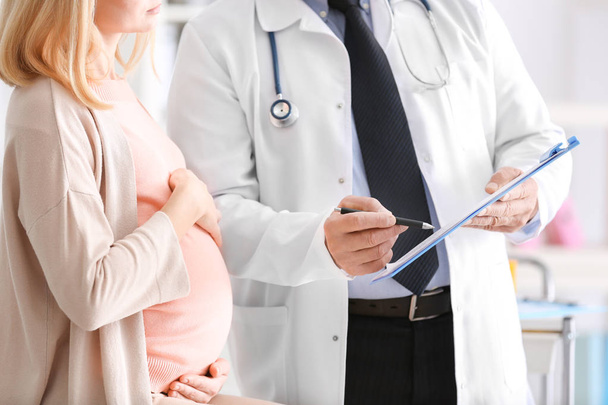 pregnant woman visiting cardiologist - Fotó, kép