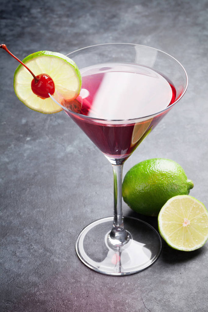 Cosmopolitan cocktail on table - Fotó, kép