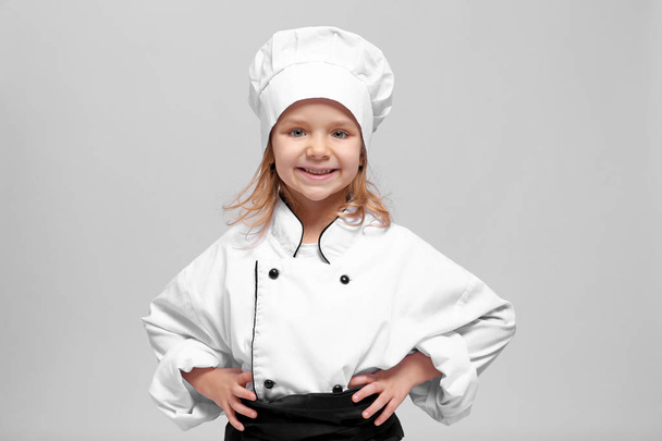 Cute girl in chef uniform  - Foto, Imagem