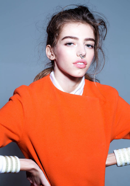 pretty fashionable girl in orange jacket - Foto, Imagem