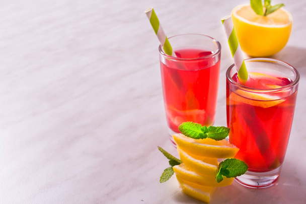 Homemade lemonade with lemons, cranberry and mint - 写真・画像