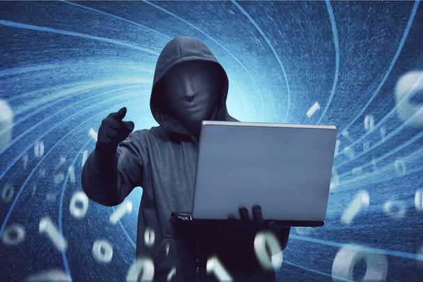 hacker holding laptop - Zdjęcie, obraz