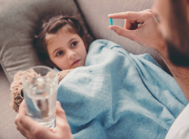 Little girl having a cold - Photo, image