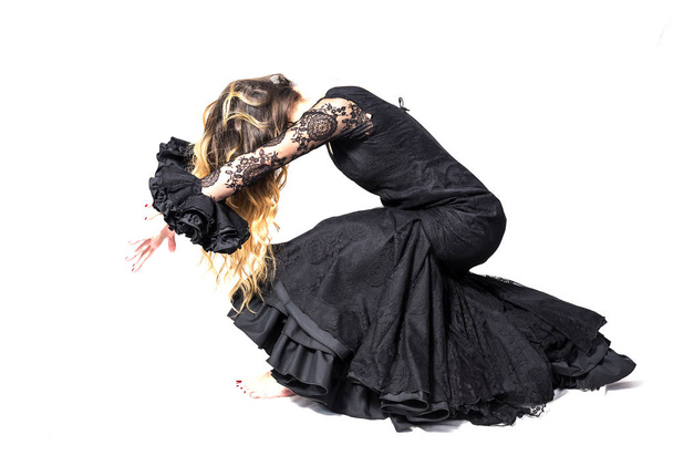 Portrait of young Flamenco dancer in beautiful dress  - Foto, afbeelding
