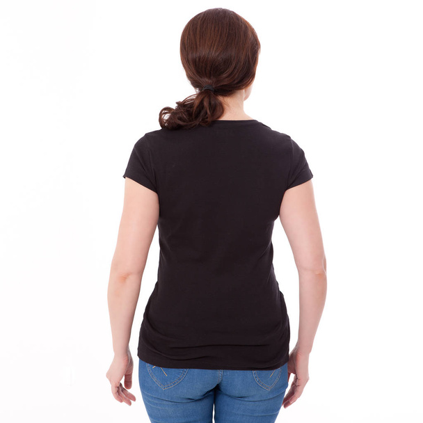 Paita suunnittelu ja ihmiset käsite lähikuva nainen tyhjä musta t-paita takana eristetty. Puhdista tyhjä mallipohja suunnittelua varten
. - Valokuva, kuva