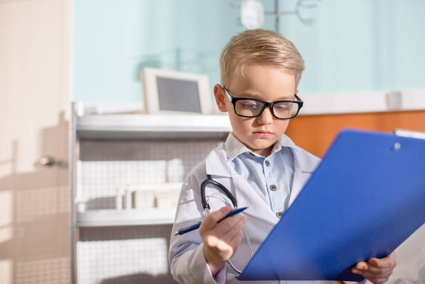 Little boy pretending to be doctor - Photo, Image