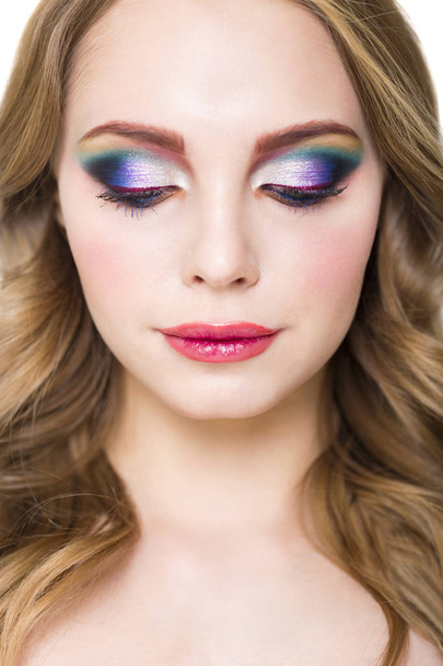Portrait of a beautiful young blond model with bright make up - Photo, Image