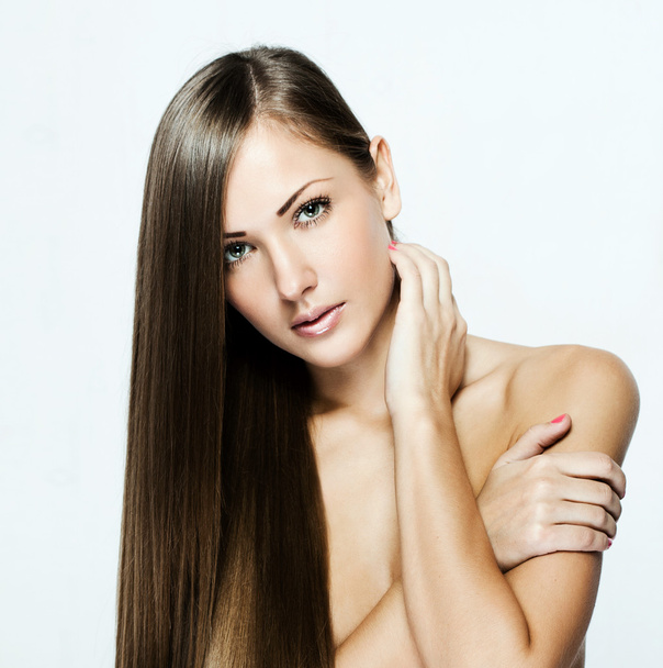 Closeup portrait of a beautiful young woman with long hair - Foto, Imagem