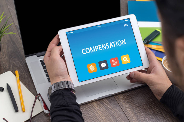 COMPENSATION CONCEPT ON TABLET  - Foto, immagini