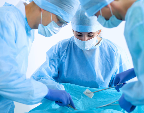 Surgery team in the operating room - Foto, immagini