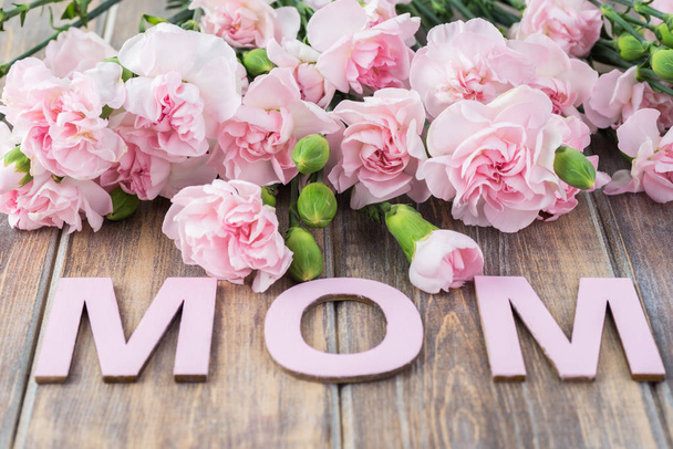 Pink carnations for Mother day. - Zdjęcie, obraz