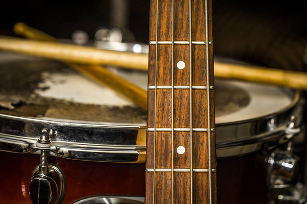 snare drum with drumsticks and bass guitar - Photo, Image