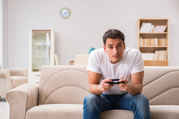 Man addicted to computer games - Photo, image