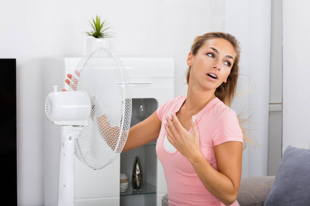 Woman Cooling Herself  - Foto, Imagen